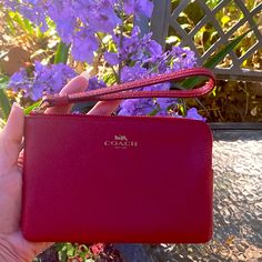 Coach Red Leather Wallet Wristlet I Accept Offers! New! Never Used! Perfect Gift For The Holiday Season! Zippered Closure Interior Built In Card Slots Measurements: L: 6" X H: 4" I Ship Same Day! I Accept Offers! New To Poshmark? Get $10 With The Code: Hopefloats5623 Check Out My Closet For Designer Items Of Every Shape & Size! Red Wristlet For Everyday Use, Elegant Red Wristlet With Zipper Pouch, Red Everyday Use Wristlet, Red Coach Wristlet With Zipper Closure, Coach Red Wristlet With Zipper Closure, Red Coach Wristlet For Everyday Use, Coach Wallet With Wrist Strap For Everyday Use, Red Clutch Wristlet For Everyday, Red Coach Wallet With Removable Pouch