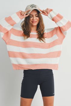 Stay stylish and cozy with our Striped Round Neck Long Sleeve Sweater. Crafted with comfort in mind, this sweater features a classic round neckline and long sleeves to keep you warm during chilly days. The charming striped pattern adds a touch of timeless flair to your wardrobe, making it a versatile piece for casual outings or relaxed days at home. Made from soft, high-quality fabric, this sweater offers both comfort and style, making it a must-have addition to your collection. Cozy Striped Ribbed Sweater, Trendy Horizontal Stripe Sweater For Winter, Striped Sweater With Ribbed Cuffs For Winter, Winter Striped Sweater With Ribbed Cuffs, Trendy Horizontal Stripe Winter Sweater, Trendy Winter Sweater With Horizontal Stripes, White Long Sleeve Sweater With Horizontal Stripes, Striped Long Sleeve Knit Sweater, Striped Crew Neck Sweater For Winter