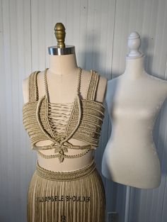 "This original, bold handmade two-piece set is definitely at its finest outside in the sunshine. It's hand knotted using macrame techniques one knot at a time with a shiny golden beige nylon cord. Perfect for someone looking for a unique outfit for all the summer/fall activities - festivals, parties, birthdays...  The dress has a corset lacing in the back so it's adjustable and fits more than just one size.  Size: XS/S (also small M) The top and a skirt are a size XS/S, but because the backside is adjustable it also fits size M. The smaller you are, the more the laces in the back close (see the last picture ). If you are unsure about the fit, please send me your measurements so I can make sure the set is a good match for you.  See the sizes below. Bust: 32\" to 36\" (81cm-92cm) Waist: 24.5 Festival Macrame, Macrame Outfit, Bohemian Bride Dress, Macrame Techniques, Corset Lacing, Macrame Dress, Diy Clothes Design, Unique Outfit, Goddess Dress