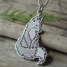 Crafted from sterling silver, this pendant measures 33mm in length and 18mm in width, capturing the intricate details of a fox's form.The fox is a symbol of resourcefulness and adaptability in nature, revered for its cleverness and ability to thrive in various environments. Our Fox Charm Necklace celebrates these qualities, serving as a wearable emblem of nature's wonder and the wisdom of the wild. Fox Charm, Foxes Necklace, Moon Phases Necklace, Silver Chain Style, Hammered Sterling Silver, Skull Necklace, Silver Fox, Silver Moon, Old Jewelry