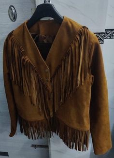 A daily outfit is incomplete without Leather which suits on all occasion, casual style, daily look, home, shopping, work, date, vacation, holiday, beach, party, or daily wear. Women Brown Native American Midwest Western Cowgirl Fringed Short Coat Jacket - Cowhide Suede - Cowgirl Jacket - Southwestern Jacket | Gift for Her Vintage Fringe Suede Brown Leather Jacket with fringe 90's Fringe Jacket / Festival Jacket / Western Jacket / Personalized Gift Description : Materials : Suede Color : Brown Cl Fall Outerwear With Tassels For Work, Fall Workwear Outerwear With Tassels, Brown Tassel Outerwear For Fall, Fall Leather Jacket With Tassels And Long Sleeves, Brown Tasseled Outerwear For Fall, Brown Tasseled Outerwear For Spring, Bohemian Brown Leather Jacket For Fall, Brown Bohemian Leather Jacket For Fall, Winter Leather Jacket With Tassels