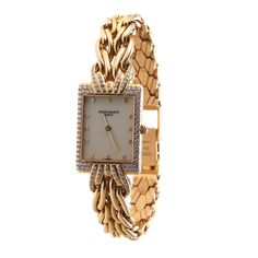 Patek Philippe La Flamme Gold Diamond Ladies Quartz Watch 4835/3. Watch is in great preowned condition, set on a original 18k gold bracelet. Weighs 93 grams. BRAND: Patek Philippe MODEL: La Flamme REF: 4835/3 CASE SIZE: Case 21mm x 29mm CASE MATERIAL: 18k Yellow Gold FUNCTIONS: Hours, Minutes CONDITION: ﻿Preowned, excellent condition BOX : No PAPERS : ﻿No Luxury Cartier Yellow Gold Diamond Watch, Luxury Coach Watch For Formal Occasions, Luxury Cartier Yellow Gold Watch, Women Patek Philippe, Luxury Vintage Yellow Gold Watch, Gold Ladies Watch, Patek Philippe Women Vintage, Patek Phillipe Women, Phillip Patek Watches