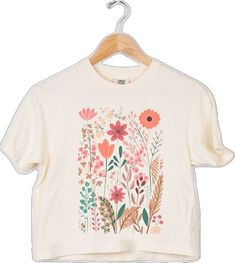 Cute Cream Relaxed Fit Top, Cream Graphic Tee For Spring, Cream Graphic Print Top For Spring, Cute Cream T-shirt For Spring, Cute Cotton Tops With Floral Print, Cream Crew Neck T-shirt For Spring, Cream Tops With Screen Print For Spring, Spring Cream Top With Screen Print, Beige Printed Cotton Tops