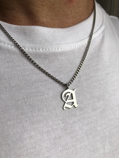 Luxury Personalized Silver Initial Necklace, Formal White Gold Jewelry With Initials, Luxury Silver Initial Pendant Name Necklace, Classic Formal Name Necklace With Initials, Classic Formal Initial Necklace, Formal Silver Stainless Steel Necklaces, Classic Polished Initial Pendant Jewelry, Sterling Silver Nameplate Jewelry With Initials, Gift White Gold Initial Necklace With Polished Finish