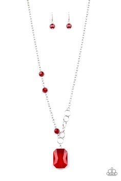 A trio of fiery red crystal-like beads asymmetrically trickle along a mismatched silver chain. Featuring a regal emerald-cut, an oversized red gem swings from the bottom of the silver chain for a glamorous finish. Features an adjustable clasp closure. Sold as one individual necklace. Includes one pair of matching earrings. P2SE-RDXX-255XX Silver Neckalce, Whimsical Heart, Never A Dull Moment, Pink Jewels, Pink Gem, Red Necklace, Fiery Red, Paparazzi Accessories, White Rhinestone