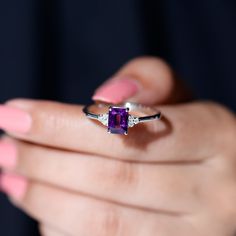 Product Details Radiate elegance with this exquisite Amethyst Ring featuring a shimmering Octagon Cut Amethyst gemstone in a delicate prong setting, beautifully accented with a trio of Diamond. Its unique design and intricate details are sure to leave a lasting impression, making it an ideal accessory for any occasion. Let this Amethyst Diamond Ring be a symbol of your love and affection, and cherish its beauty for years to come. Product Information SKU SHP-RINGS0821229273 Width 3.5 mm Height 7. Elegant Asscher Cut Purple Ring, Purple Birthstone Ring With Gemstone Accents, Elegant Purple Asscher-cut Ring, Elegant Purple Asscher Cut Ring, Fine Jewelry Purple Octagon Rings, Fine Jewelry Purple Birthstone Ring With Accent Stones, Purple Birthstone Ring With Accent Stones, Fine Jewelry Purple Birthstone Ring With Diamond Accents, Purple Amethyst Ring With Diamond Accents For Gift