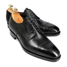 CAPTOE DERBY SHOES IN BLACK BOXCALF Classic Closed Toe Formal Sneakers, Classic Black Lace-up Derby Shoes, Classic Sneakers With Rubber Toe Cap, Black Cap Toe Derby With Rubber Sole, Black Cap Toe Derby Shoes With Rubber Sole, Cordovan Shoes, Leather Industry, Exclusive Shoes, Women's Mules