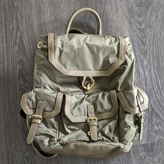 Never Used. Casual Softback Backpack For Errands, Trendy Khaki Backpack With Adjustable Strap, Casual Softback Backpack With Detachable Strap, Casual Shoulder Bag With Buckle Closure For Travel, Casual Travel Shoulder Bag With Buckle Closure, Preppy Green Travel Bag, Casual Backpack For Errands, Casual Standard Backpack For Errands, Casual Standard Backpack