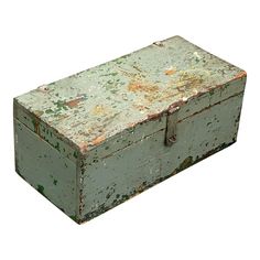 an old green box with rusted paint on the outside and inside, sitting in front of a white background