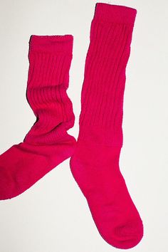 Slouchy knee high socks in a cotton/nylon blend. Thick ribbed cuff and a slim, fitted foot. Made in the USA. Available in multiple colors. Fitted Red Cotton Socks, Winter Cotton Knee-high Socks, Pink Knee-high Socks As Stocking Stuffer For Winter, Fall Season Pink Stretch Knee-high Socks, Fitted Pink Knee-high Socks For Fall, Cotton Stretch Solid Color Hosiery, Stretch Cotton Solid Color Hosiery, Cotton Knee-high Winter Socks, Winter Knee-high Cotton Socks