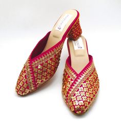 Check out our new collection of designer wedding shoes which we offer for you. These beautiful shoes are pink with gold sequins work on embroidered all around the shoe and round front shaped. These are extremely comfortable wedding shoes with a low heel these are comfortable to wear for long hours. These are perfect for your wedding or a formal event. These bridal shoes offer a heel size of 3 Inches. Don't miss out on these beauties! See our page for more of our collection! We ship out in a timely matter, wrapped in care for a safe secure trip to your location. Thank you for supporting our small business! Shipped from USA. Sizes available US 6,7,8,9,10. Indian Wedding Heels, Party Heels With Round Toe And Slip-on Fit, Pink Embellished Heels For Wedding, Spring Wedding Slip-on Shoes, Pink Low Heel Block Heels For Formal Occasions, Gold Slip-on Heels For Wedding, Summer Party Slip-on Wedding Shoes, Elegant Sequined Round Toe Wedding Shoes, Elegant Pink Closed Toe Block Heels