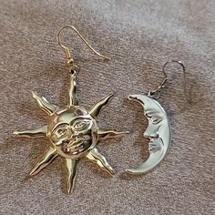 This Is One Of The Most Unique Pair Of Celestial Themed Earrings I've Ever Seen. Please See Pictures For More Explicit Details. The Sun Is Gold With A Face And Rays Spreading Around The Outer Area. The Moon Is Silver With A Face And Is Crescent Shaped. They Look Great Together And Will Match All Your Jewerly Or So Unique To Wear Separately Alone. Just A Great Pair With So Many Options. Moon Color, Oc Inspo, Crescent Shape, Dope Jewelry, Sun Moon, A Face, See Picture, Things To Buy, Crescent