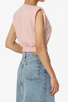 Elevate your weekend casual look with this modern, sleeveless Padded Shoulder Cotton Jersey Blouson Crop Tank Top.A perfect blend of comfort and style, this slim-fit top features a round neck, solid color, and an elastic waistband for a flattering silhouette.Ideal for summer, its lightweight fabric ensures breathability.Pair it with high-waisted jeans or shorts for a chic ensemble.Padded Shoulder Crop Top: A chic, sleeveless design that adds an edge to your outfit.Cotton Jersey Comfort: Soft, breathable fabric perfect for all-day wear.Elastic Waist Blouson: Creates a flattering, cropped silhouette for a touch of modern elegance.Versatile Style: Ideal for pairing with high-rise denim or skirts, transitioning seamlessly from day to night.Model size : 5'3" height, 33" bust, 24" waist, 34" hip Spring Sleeveless Blouse In Solid Color, Solid Color Tank Top For Spring, Spring Season Solid Color Tank Tops, Chic Cotton Tank Top In Solid Color, Trendy Cotton Sleeveless Blouse Crop Top, Chic Solid Color Cotton Tank Top, Slim Fit Top, L And Light, Crop Tank Top