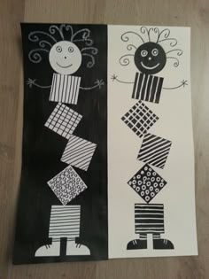 two black and white paper cut outs with different designs on them