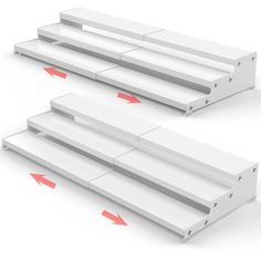 two white shelves with red arrows pointing to the top and bottom one on each side