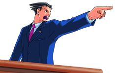 a man in a blue suit pointing at something on the table with his finger out