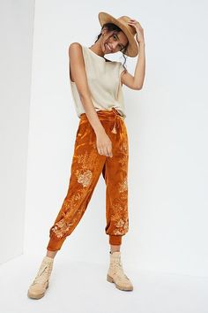 #bx269/251 Style No. 4123089540002; With a plush velvet finish, these embroidered joggers put an elevated spin on one of our favorite silhouettes. Viscose Embroidered detail Removable belt Side slant pockets Pull-on styling Dry clean Imported Dimensions Standard: 13.75" rise 23" inseam 10" leg opening size S  waist 25" new with tag Velvet Joggers Outfit, Anthropologie Holiday, Velvet Joggers, Holiday Wishlist, Embroidered Velvet, Joggers Outfit, Fall Wear, Velvet Tops, Romper With Skirt