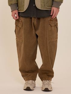 Editor's NotesPigment-washed cargo pants from CARGOBROS feature a wide silhouette and banding closure for comfortable fitting.- Banding closure- Wide fit- Drawstring at waist- Pigment washing denim- Versatile and casual itemMeasurements(in.)One size- Total length: 39.37 in.- Waist: 13.38 - 19.29 in.- Thigh: 16.53 in.- Front rise: 16.53 in.- Hem: 8.66 in.Model infoMan - 5'74 Composition & Care- 100% Cotton- Please check the care labelDesigner- by CARGOBROS Baggy Utility Khaki Jeans, Vintage Cotton Cargo Jeans With Multiple Pockets, Brown Baggy Cargo Pants For Fall, Urban Brown Cargo Pants For Streetwear, Brown Wide Leg Utility Pants, Casual Brown Cargo Pants For Streetwear, Vintage Baggy Cargo Jeans With Pockets, Brown Casual Cargo Pants With Multiple Pockets, Baggy Brown Cargo Pants With Cargo Pockets