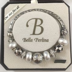 This Is A Gorgeous Stainless Steel And White Pearl Charm Bangle Bracelet By Bella Perlina. The Bangle Opens With A Hinge Mechanism. You Can Insert Or Remove The Charms Using The Screw Cap In One End Of The Bangle. Will Fit Any Wrist Size. In Unused Vintage Condition. White Metal Pearl Bracelet With Jubilee Details, White Metal Charm Bracelet, White Metal Pearl Bangle Bracelet, White Beaded Charm Bangle Bracelet, White Beaded Charm Bracelet Bangle, White Metal Beaded Bracelet, White Beaded Metal Bracelet, White Metal Beaded Bracelets For Party, Adjustable White Bracelet For Anniversary