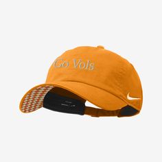 Top off your game-day look with this adjustable Tennessee cap. Collegiate Snapback Hat With Curved Bill, Adjustable Collegiate Hat With Curved Visor, Collegiate Adjustable Baseball Cap With Curved Brim, Sporty Adjustable Nike Trucker Hat, Nike Sporty Adjustable Trucker Hat, Game Day Embroidered Logo Snapback Dad Hat, Game Day Snapback Dad Hat With Embroidered Logo, Embroidered Logo Snapback Dad Hat For Game Day, Nike Casual Trucker Hat For Sports