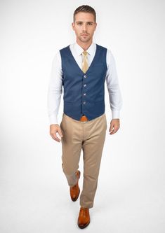 Experience classic styling and modern finesse wearing the Prussian Blue Pinstripe vest. Featuring a vibrant blue hue with subtle pinstripes, this custom made vest will make you feel vibrant and confident. Classic Navy Sleeveless Vest, Blue Fitted Denim Vest For Work, Blue Fitted Denim Vest For Office, Formal Striped Sleeveless Vest, Elegant Blue Vest, Elegant Blue Sleeveless Vest, Tailored Pinstripe Business Vest, Tailored Pinstripe Vest For Business, Tailored Pinstripe Sleeveless Vest