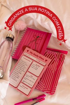 the contents of a personal care kit are laid out on a white sheet with pink writing