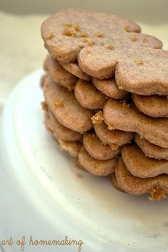 a stack of cookies sitting on top of a white plate