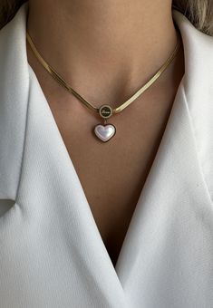 18K Mother of Pearl Heart Necklace  🏷️ 40% OFF TODAY ONLY\   BLACK FRIDAY DEAL: BUY 2 GET 1 FREE PROMO CODE IS: GET1FREE * Material: 18K Gold Plated  * Length/Diameter: 40cm \ 15.74' * Tarnish free * Safe for sensitive skin * Hypoallergenic, lead and nickel free O T H E R ∙ I N F O R M A T I O N  ✨Delivery Time for UK: 2-4 days  ✨Delivery time for International: 4-8 days ✨ All items are nicely packaged and giftable in elegant jewellery bags. ✨ If you can't find the information you need or need Trendy Heart Pendant Necklace For Anniversary, Trendy Necklaces For Valentine's Day Anniversary, Trendy Necklace For Anniversary On Valentine's Day, Trendy Anniversary Necklaces For Valentine's Day, Trendy Anniversary Necklace For Valentine's Day, Trendy Heart Charm Necklace For Anniversary, Trendy Heart Necklace For Anniversary, Heart Graphic Jewelry For Valentine's Day, Pearl Heart Necklace