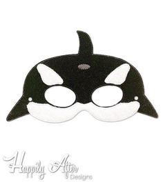 an orca whale mask with white eyes and black nose, on a white background