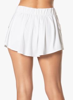 This white cargo skirt will be your go-to skirt of the season. A mixed media of mesh and performance jersey come together to create a uniquely fashionable sporty look. Featuring a high-low hemline for contemporary styling. White Cargo Skirt, Pocket Skirt, Lucky In Love, Cargo Skirt, Cargo Pocket, Dress Gift, Long Sleeves Jacket, Sporty Look, Tennis Skirt