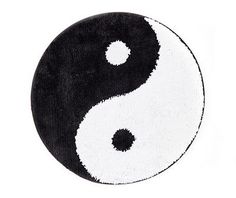 a black and white yin symbol on a white background