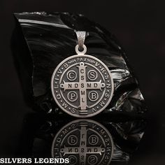 Sterling Silver Medallion Necklace With Charms As Gift, Silver Symbolic Medallion Necklace, Silver Spiritual Medallion Necklace Gift, Personalized Sterling Silver Medallion Necklace, Spiritual Silver Jewelry With Coin Pendant, Silver Cross Necklace With Coin Pendant, Silver Round Medallion Necklace For Gift, Personalized Silver Round Medallion Necklace, Round Silver Medallion Necklace For Gift