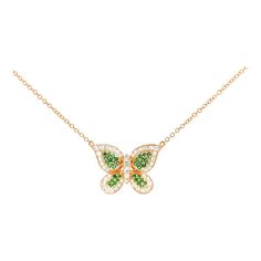 Presenting our stunning Natural Green Tsavorite and Diamond Butterfly Motif Pendant Necklace delicately cradled within the radiant glow of 14K Yellow Gold.  This pendant showcases vibrant round-cut green tsavorite wings, meticulously secured with a pave cluster setting, complemented by dazzling diamonds that accentuate the intricate butterfly design.  100% waterproof and hypoallergenic. The perfect piece for daily wear. These earrings offer both elegance and practicality. The stones are expertly set, ensuring their secure placement and preserving their flawless charm, with no risk of loosening, denting, or stones falling out.   Item Details: - Type: Pendant Necklace  - Metal: 14K Yellow Gold  - Weight: 3.80 Grams  - Setting: Pave  - Size: 18 inches  - Measurements: 15 X 22 MM  ____________ Luxury Green Diamond Necklace For May Birthstone, Yellow Gold Tsavorite Gemstone Necklace, Green Diamond Necklace In Fine Jewelry Style, Luxury Tsavorite Gemstone Necklace, Luxury Yellow Gold Tsavorite Necklaces, Green Gemstone Diamond Necklace Gift, Green Gemstone Diamond Necklace As A Gift, Green Gemstone Diamond Necklace For Gift, Luxury Green Diamond Necklace As Gift