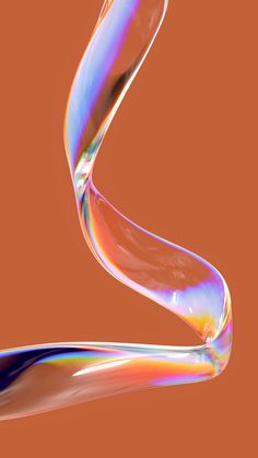 an abstract image of colorful liquid flowing from the top to the bottom, against a brown background