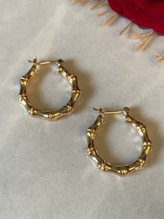 These gold filled bamboo hoop earrings are known for their durability, versatility and natural beauty. These hoops are perfect for everyday wear! Hypoallergenic Water Resistant Hand made with love 18kt Gold Filled Small 20mmx25mm Medium 24mmx28mm Large 34mmx39mm Cute Earrings Hoops Gold, Small Hoop Earrings Aesthetic, Gold Hoops Aesthetic, Minimalist Accessories Jewellery, Gold Earrings Hoops, Gold Bamboo Earrings, Bamboo Earring, Afro Jewelry, Jewelry Necklace Simple