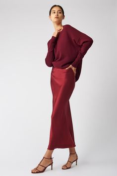 Kal Rieman Bias Silk Skirt in bordeaux on model side view holding hip Minimal Skirt, Silk Skirts, Capsule Wardrobe Pieces, Cashmere Poncho, Business Casual Outfits For Women, Diy Fashion Clothing, Favorite Sweater, Silk Charmeuse, Beautiful Blouses