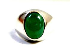 This Beautiful Ring is embedded with all Natural EMERALD in 925 Sterling Silver with a Virtual CERTIFICATE OF AUTHENTICITY OF THE GEMSTONE & SILVER. We have all Sizes Available and always welcome Customizations. Your item will arrive in a Cute Velvet box with absolutely FREE SHIPPING. 💎 Gemstone: Natural Emerald 💎 Base Material: Solid Sterling Silver (925) 💎 Stamps / Markings: 925 - Each stone has different markings and tones reminding you that not only is this truly a piece of the earth but Classic Oval Cabochon Gemstones With Polished Finish, Classic Formal Gemstones With Stone Setting, Silver Polished Oval Cabochon Emerald Ring, Classic Gemstones With Stone Setting For Anniversary, Silver Emerald Oval Cabochon Ring, Silver Emerald Ring With Polished Oval Cabochon, Classic Sterling Silver Emerald Ring With Polished Finish, Classic Silver Emerald Ring With Polished Finish, Emerald Cabochon