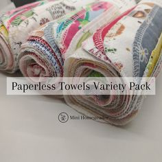 several rolled up towels sitting on top of each other with the words paperless towels variety pack