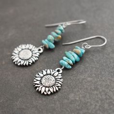 Sunflower Earrings with natural turquoise gemstones, pewter sunflower. a perfect nature-inspired gift for a loved one, special friend, or just for you! DETAILS ♥ Earrings are 2 inches in length. ♥ On hypoallergenic surgical steel french earring wire... ♥ All Earrings come with rubber ear backs. ♥ All of my pewters are lead-free. ♥ I use all-natural gemstones and freshwater pearls. SHIPMENT & DELIVERY ♥ All my items are ready to ship within 1-3 business days. ♥ Packages are typically shipped Turquoise Flower Earrings As A Gift, Turquoise Flower Charm Earrings For Gift, Gift Turquoise Flower Earrings, Gift Turquoise Flower Charm Earrings, Turquoise Nickel Free Flower Earrings, Nickel Free Turquoise Flower Earrings, Bohemian Turquoise Flower Shaped Jewelry, Bohemian Turquoise Flower-shaped Jewelry, Turquoise Flower Earrings Gift