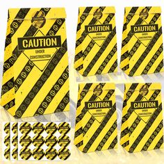 caution signs and stickers are shown in this image