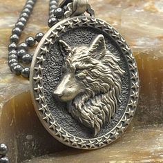 Sterling Silver Wolf Necklace, Unique Silver Wolf Pendant, Animal Lovers Necklace, Gothic Necklace Jewelry, Mens Wolf Necklace This beautiful Shield Pendant is handcrafted with the utmost care. Made of the highest quality silver that is completely safe for your skin. During its production, we made sure that every detail was perfect. Our  Sterling Silver Pendant has special handmade engraving details and photos are taken with original products. It's very elegant and classy for everyday use and gives a stylish look to your outfits. This unique and simply perfect Sterling Silver Pendant will definitely attract the attention of everyone present! This Handmade Silver Necklace can be a perfect gift for anyone. With the powerful message it carries, inspire your loved ones. You can give it to anyo Wolf Necklace Men, Wolf Pendant, Wolves Pendants, Wolf Necklace, Wolf Jewelry, Necklace Gothic, Oc Inspo, Jewelry Mens, Silver Wolf