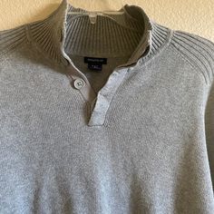 Gap Gray 4 Button Mock Neck Pullover Sweater. Size M Pit To Pit 20” Length 26” Ribbed Collar, Cuffs And Waistband. Excellent Used Condition. Looks Brand New. Classic Gap Tops For Winter, Classic Winter Tops From Gap, Classic Winter Henley With Button Closure, Classic Henley With Button Closure For Winter, Casual Winter Henley With Button Closure, Gray Cotton Sweater With Button Closure, Gap Sweater, Mock Neck Sweater, Pullover Sweater