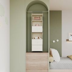 a bedroom with green walls and white furniture