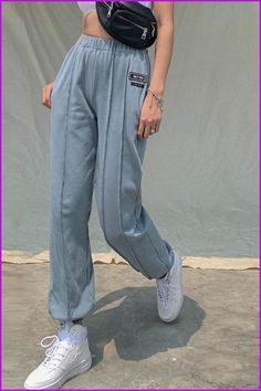 Specification Material: Cotton Material: Spandex Length: Full Length Pattern Type: Solid Style: Office Lady Pant Style: Harem Pants Front Style: Flat Fabric Type: Knitted Closure Type: Elastic Waist Baggy Blue Bottoms For Leisure, Blue Athleisure Sweatpants For Spring, Light Blue Mid-rise Casual Pants, Casual Light Blue Mid-rise Pants, Spring Blue Athleisure Sweatpants, Blue High Waist Trendy Sweatpants, Casual High Waist Blue Sweatpants, Trendy Straight Leg Leisure Bottoms, Casual High-waist Blue Sweatpants