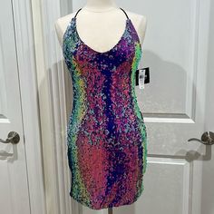 a dress on a mannequin in front of a door