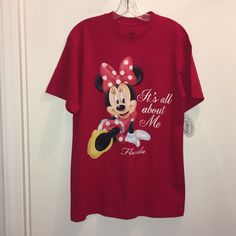 a red shirt with minnie mouse on it that says it's all about me