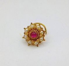 Antique design handmade 20 karat yellow gold nose pin excellent stylish women's jewelry from Rajasthan Indiaweight-0.840 grams approx.Item type-Nose pin.Metal-20k yellow gold.width-9.5 mm approx.stone- white pearl.condition-excellent, brand new.Brand- handmade. Gold Kundan Nose Ring In Temple Jewelry Style, Gold Kundan Nose Rings Temple Jewelry, Traditional Gold Nose Rings For Festive Occasions, Traditional Gold Festive Nose Rings, Temple Jewelry Style Round Nose Rings For Festivals, Traditional Yellow Gold Round Nose Rings, Traditional Tilla Nose Ring, Mughal Jewelry, 22k Gold Chain