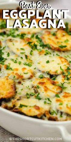 eggplant lasagna in a white casserole dish with parsley on top