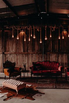 a living room filled with furniture and lots of lights