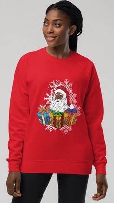 This red Christmas sweatshirt features a black Santa with African wrapped gifts for both men and women. The sweatshirt is beautiful and sure to keep you warm and stylish all day long. It does not only stand out but also comfy and soft to the touch and great for the festive or Christmas season. Matching items are available in shop for black santa family Christmas Sweaters   Features : 80% Soft cotton; 20% Polyester : Medium-heavy fabric : Regular fit Includes gift wrapping  You can start a conver Christmas Graphic Print Long Sleeve Hoodie, Red Long Sleeve Christmas Hoodie, Christmas Gift Long Sleeve Sweatshirt, Crew Neck Sweatshirt For Winter Gift, Holiday Long Sleeve Sweatshirt As Gift, Winter Gift Long Sleeve Sweatshirt, Red Winter Sweatshirt As Gift, Red Christmas Sweatshirt With Letter Print, Red Cotton Christmas Sweatshirt